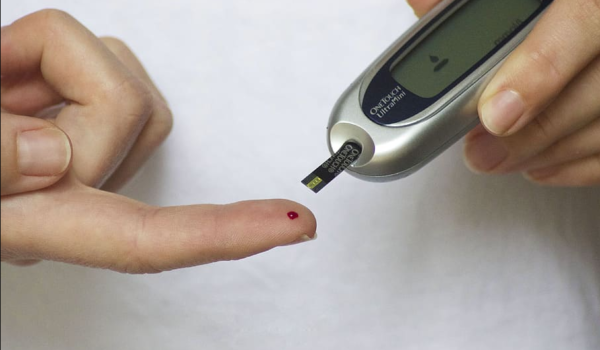 measuring blood sugar with a glucometer