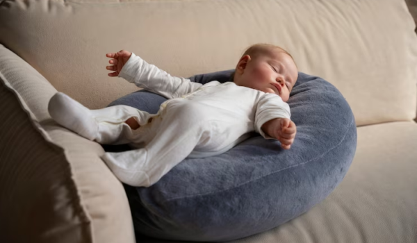 Baby Lies on Nursing Pillow